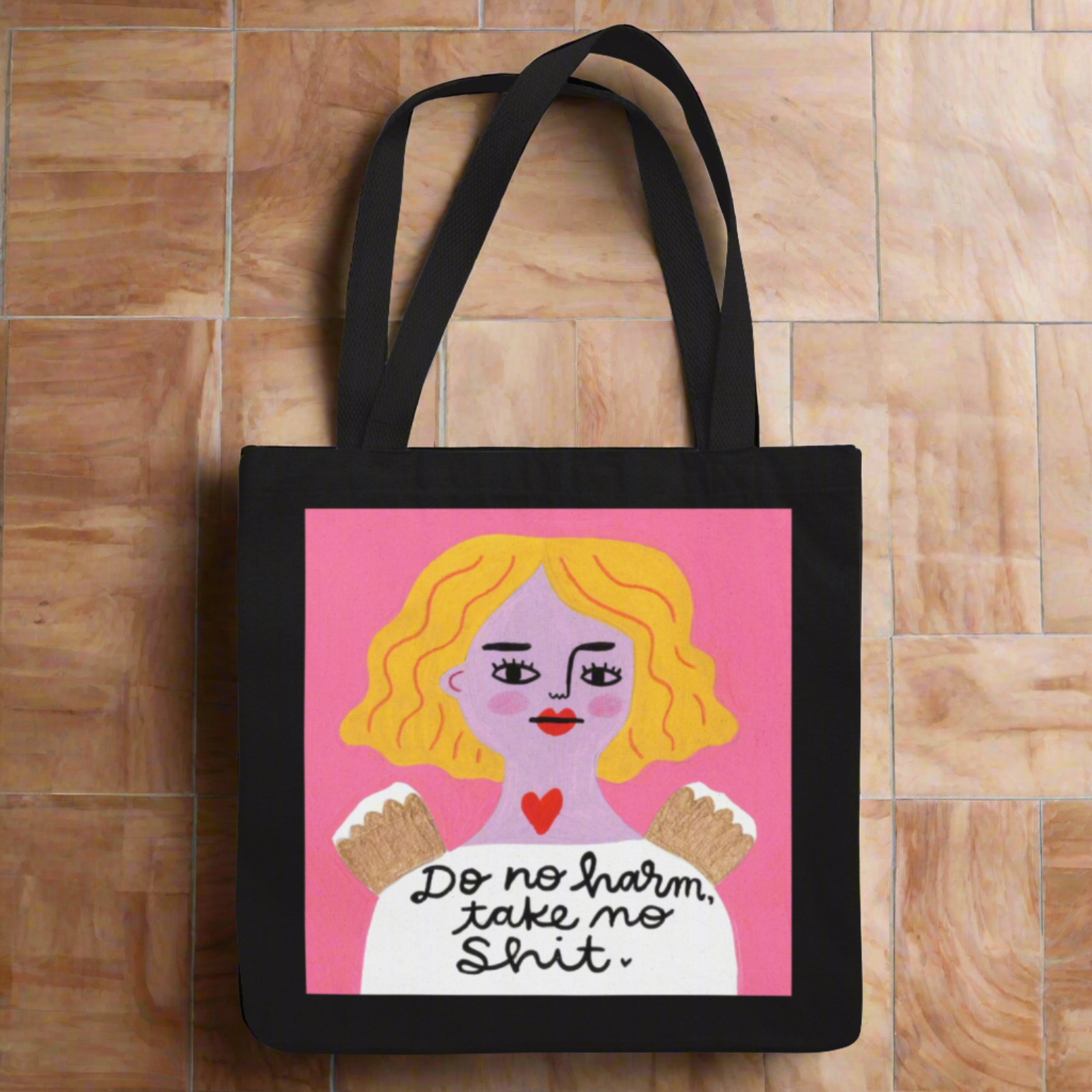 Black tote bag with Grumpy Angel design "Do no harm. take no shit"